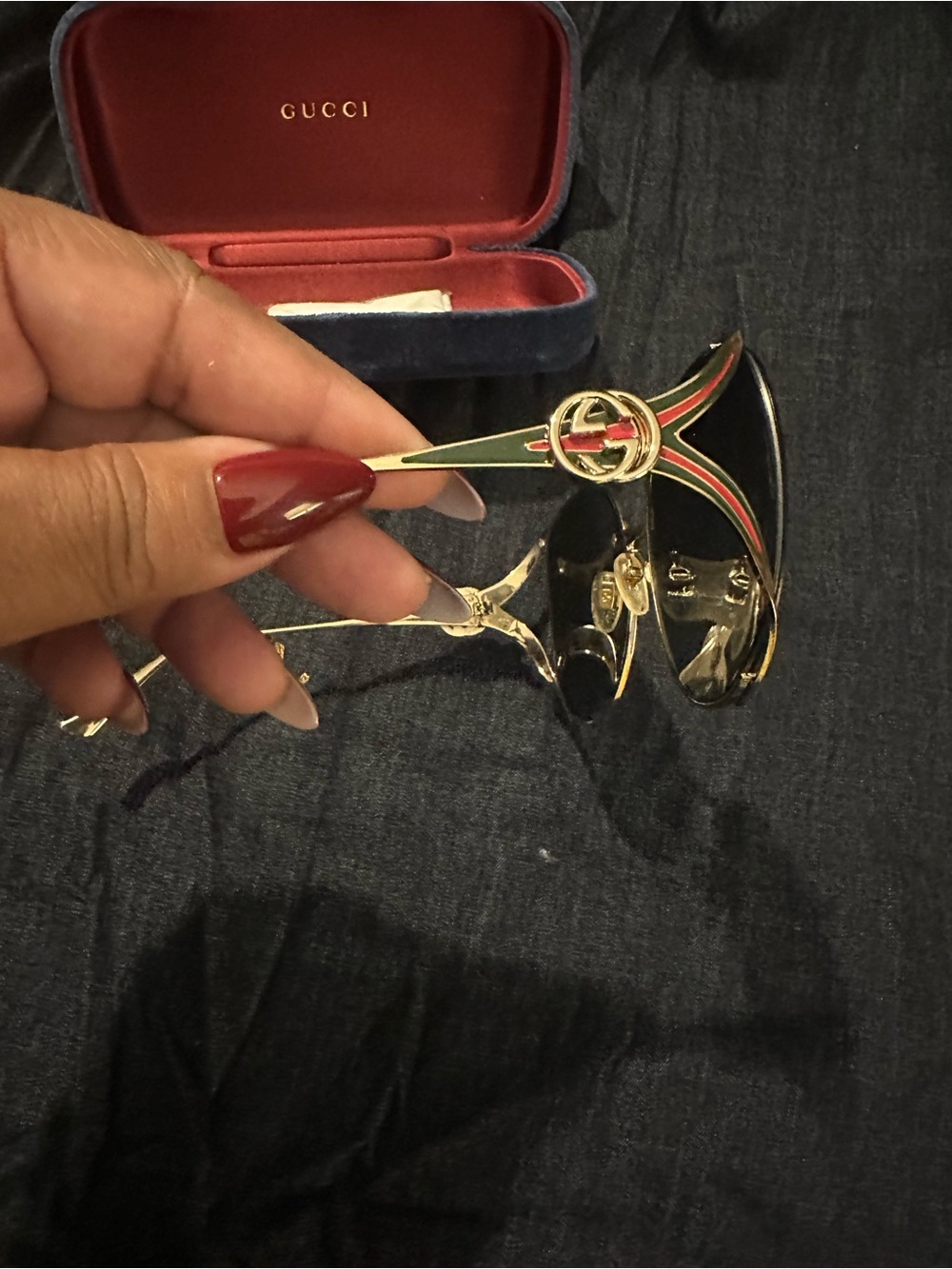 Gucci Gold Shield Sunglasses with Black Lenses and Green-Red Temple